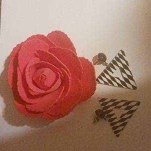 Black and white triangle shaped earrings.